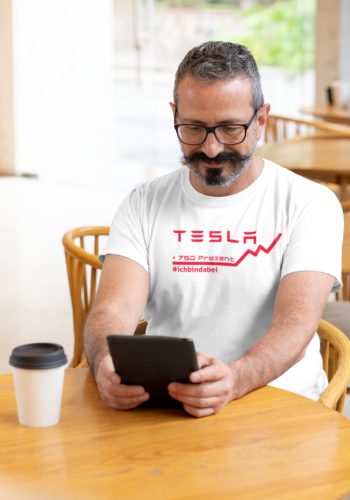 t-shirt-mockup-featuring-a-man-reading-at-a-cafe-31712